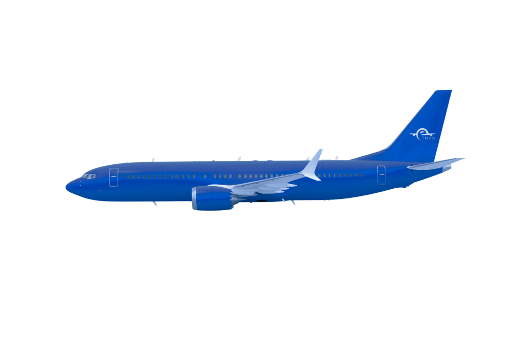 Вид спереди на самолет, стоящий в ангаре на фоне заката, золотистый свет отражается от пола ангара и корпуса самолета